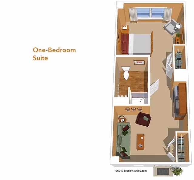 3D floor plan of a one-bedroom suite showing a bedroom with a bed, nightstand, and chair; a bathroom with a toilet and shower; and a living area with a sofa, armchair, coffee table, and TV. The suite also includes closets and a small entry area.