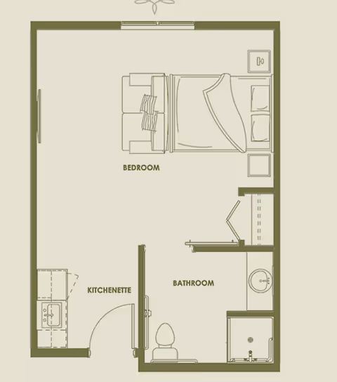 Floor plan of a senior living unit at Spring Gardens Senior Living Meridian showing a bedroom with a bed and sofa, a kitchenette with a sink and counter, and a bathroom with a toilet, sink, and shower.
