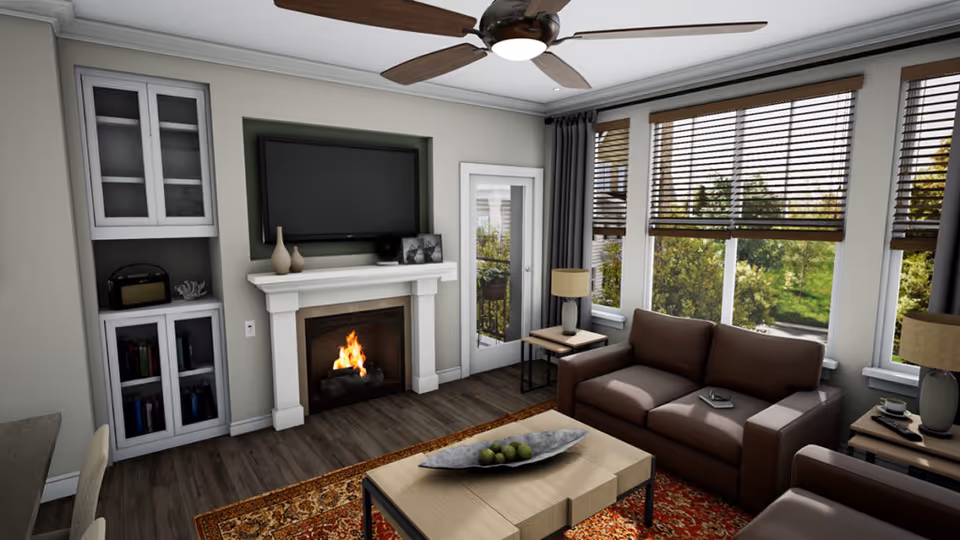 Sunlit living room with a sofa and armchair, coffee table, fireplace with a wall-mounted TV above, and large windows with blinds.