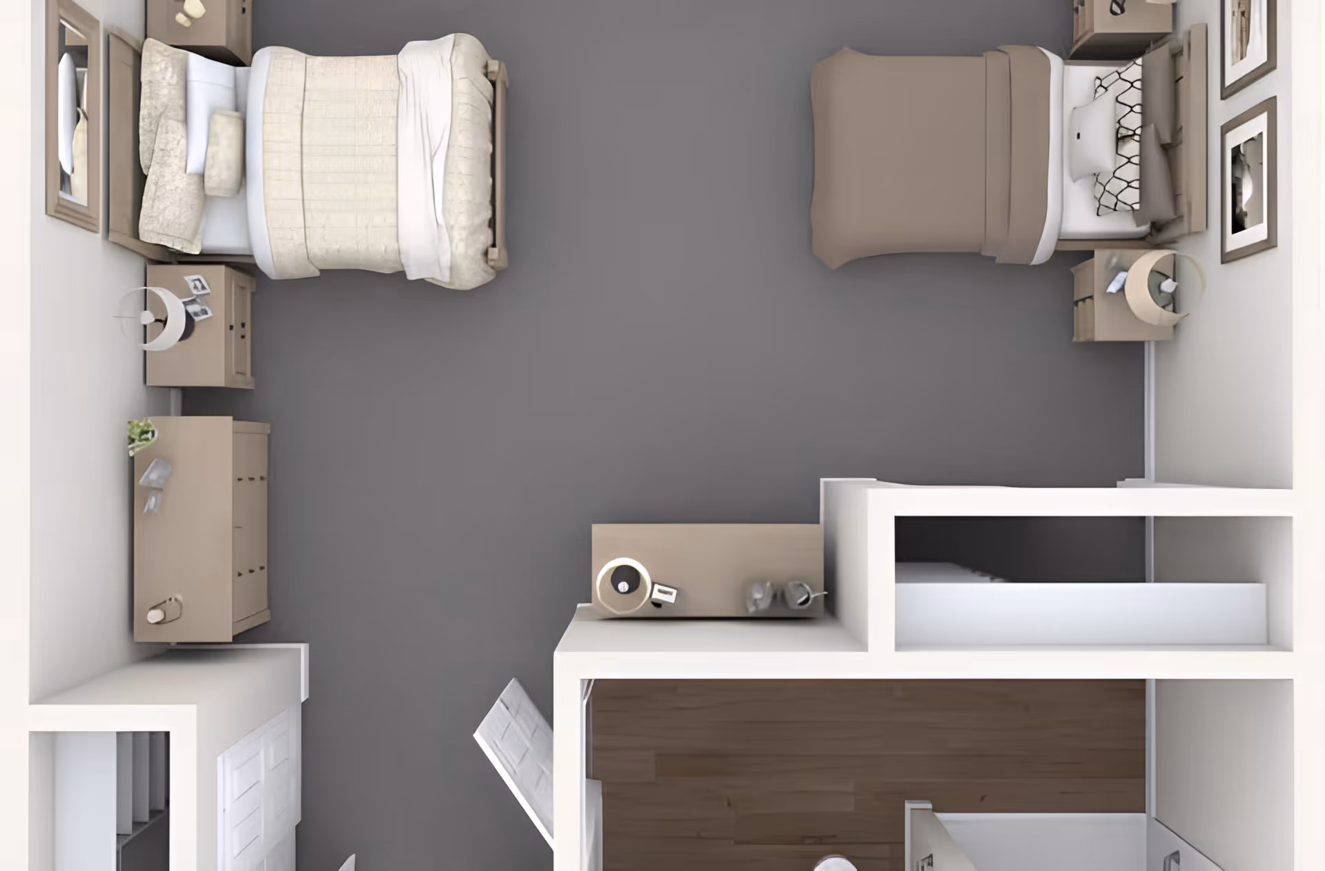 Top-down view of a shared bedroom with two beds, each with bedside tables and lamps. The room has a gray carpet, dressers, and framed pictures on the walls. There is a small closet area and an open door leading to another room with wooden flooring.