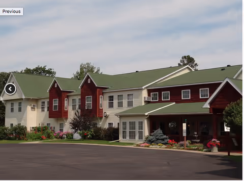 Exterior view of Edgewood May Creek facility with green roofs and landscaped entrance.