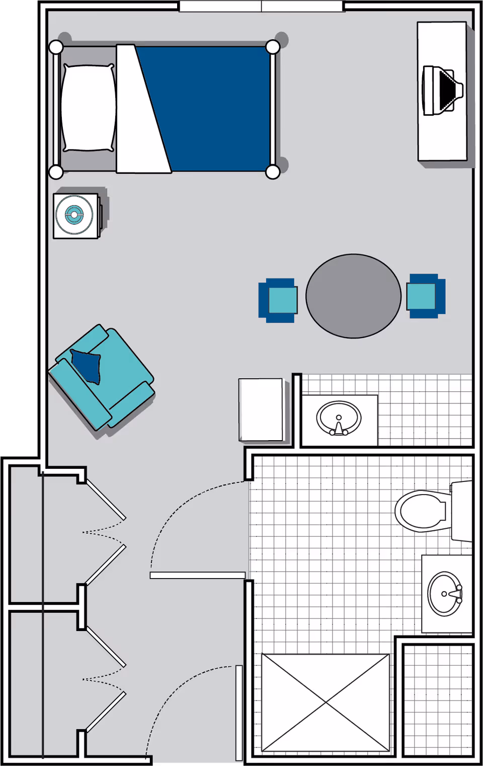 Floor plan of a senior living facility room at Oaks at Charleston showing a bedroom area with a bed, nightstand, armchair, and TV, a small dining area with a round table and two chairs, and a bathroom with a toilet, sink, and shower.