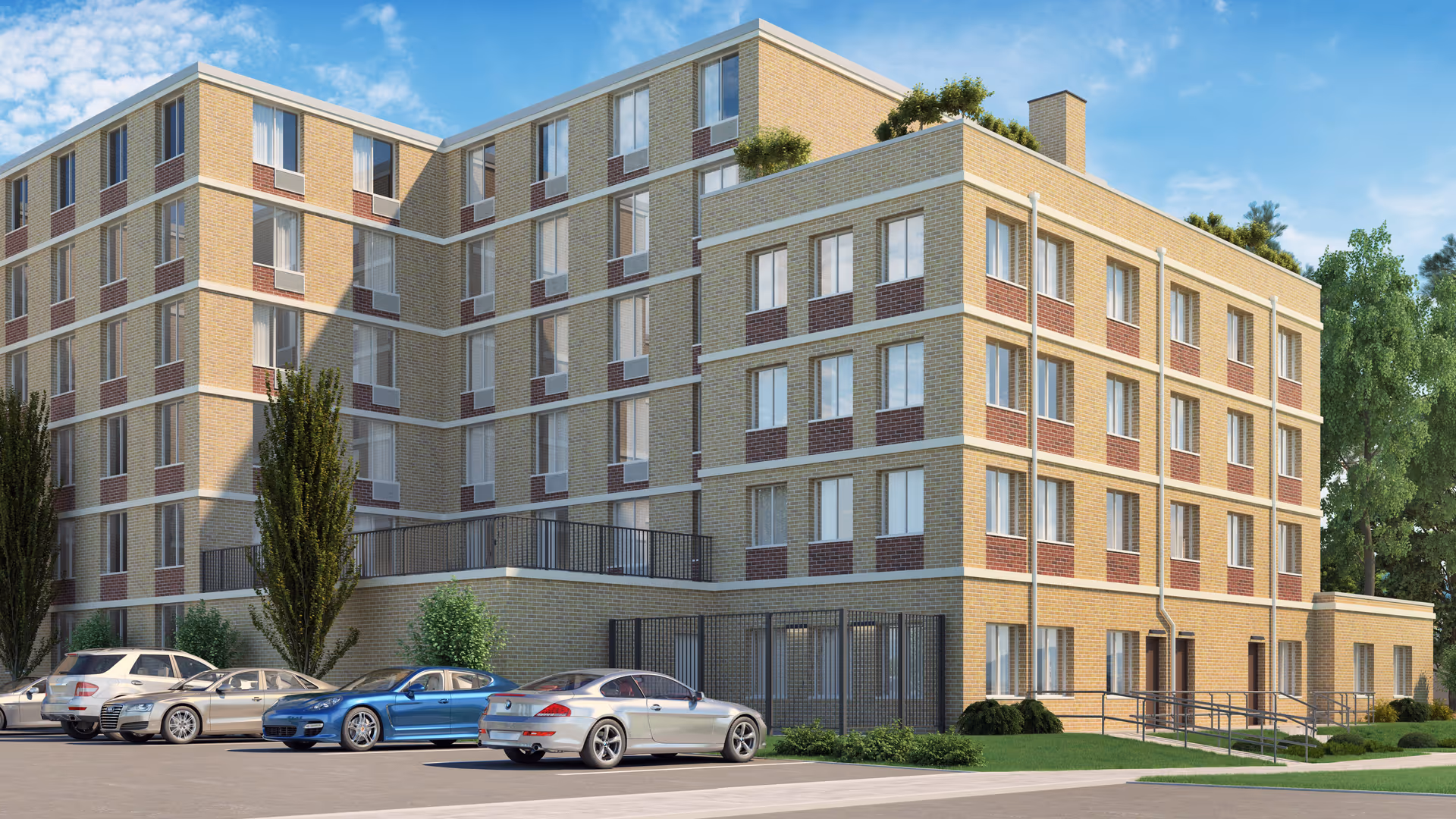 Brick multi-story senior living building with parked cars in front and landscaped grounds.