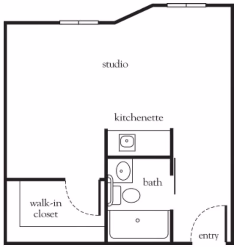 Floor plan of a studio apartment at Atria Park of San Mateo showing an entry, bath with toilet, sink, and bathtub, kitchenette, studio living area, and a walk-in closet.