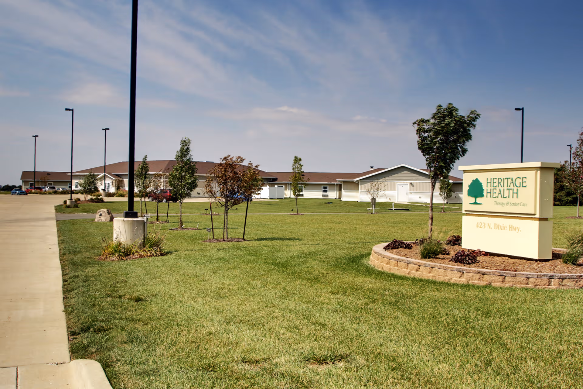 Exterior view of Heritage Health therapy and senior care facility with landscaped grounds.