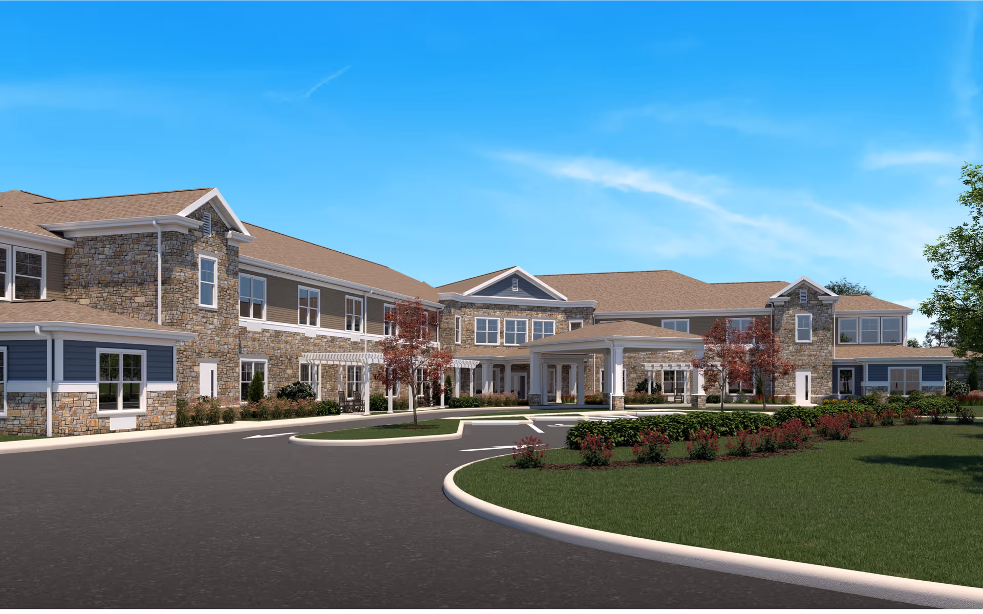 Exterior view of Brightstar Senior Living of Mason, showing a large two-story building with stone and siding facade, multiple windows, a covered entrance, landscaped grounds with green grass, shrubs, and small trees under a clear blue sky.