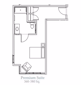 Floor plan of a premium suite at Grand Brook Memory Care of Fishers, showing a bedroom area with a bed and chair, a bathroom with a shower and toilet, and entry doors. The suite size is 360-380 square feet.