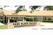 Single-story brick nursing and rehabilitation facility with a front sign reading "Park Place Manor Nursing and Rehabilitation," trees, and a driveway.