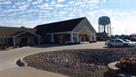 Exterior view of Villas of Holly Brook Chatham front entrance with circular driveway