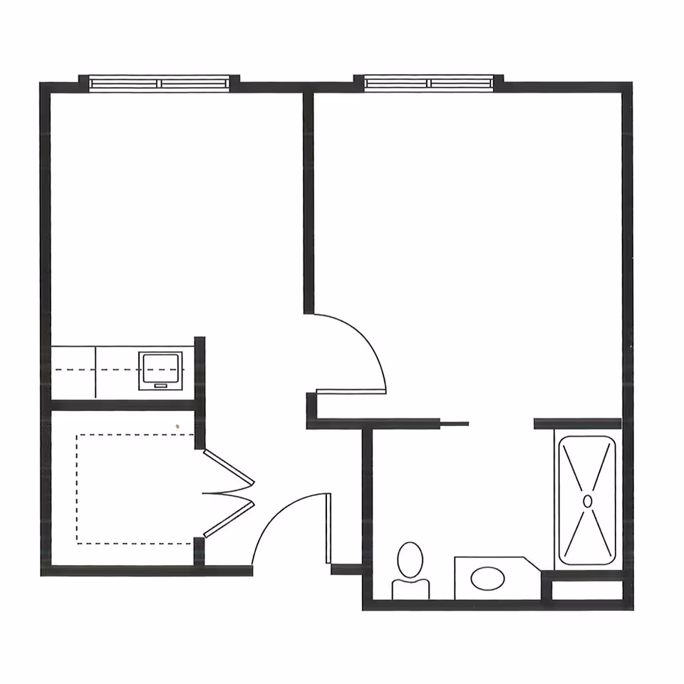 Architectural floor plan of a small apartment or unit showing a layout with a bedroom, bathroom, and a small kitchen area.