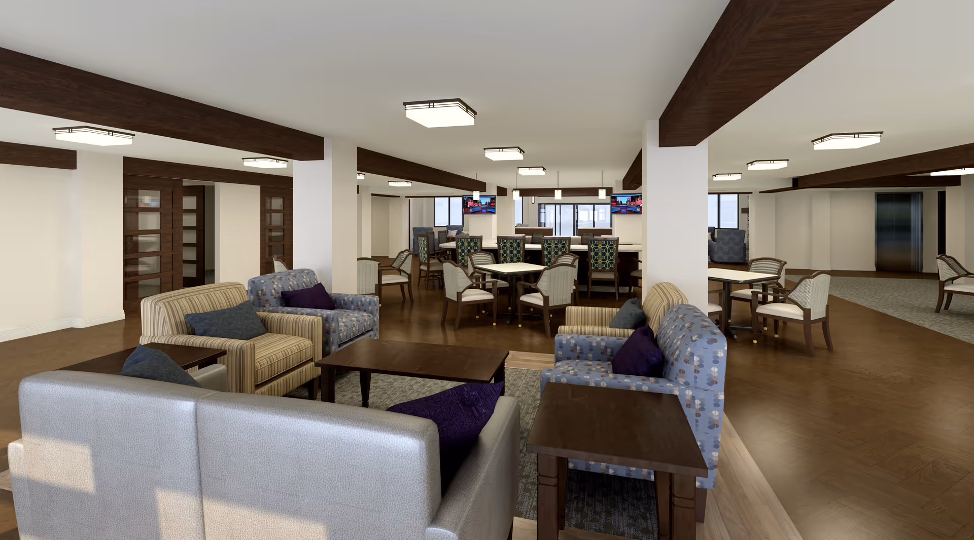 Spacious senior living community common area with multiple seating arrangements including sofas and armchairs around coffee tables, several dining tables with chairs, wooden beams on the ceiling, and modern ceiling lights. The room has a warm and inviting atmosphere with a mix of carpet and hardwood flooring.