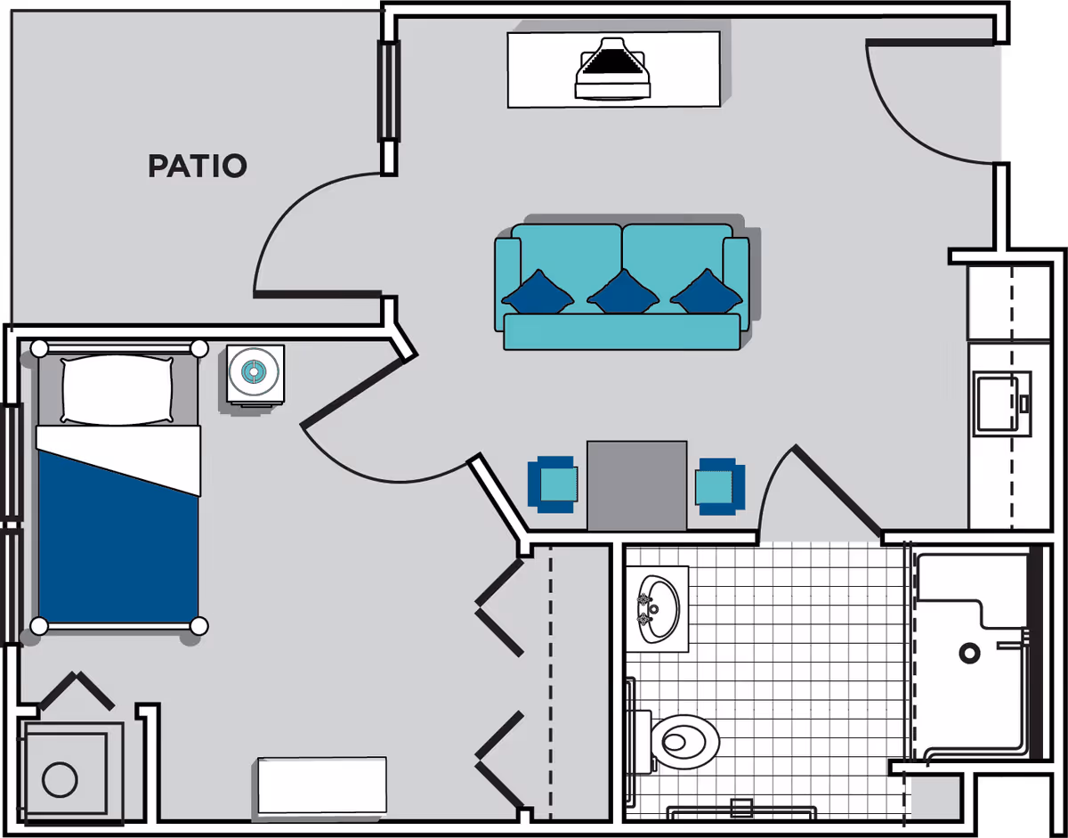 Floor plan of a senior living unit at Oaks at Alpharetta showing a bedroom with a bed and nightstand, a bathroom with a sink, toilet, and shower, a living room with a sofa, coffee table, and two chairs, a kitchen area, and a patio.