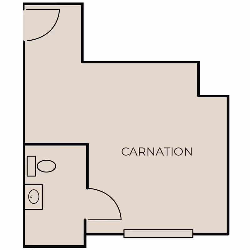 Floor plan layout labeled 'CARNATION' showing a main room with an attached bathroom that includes a toilet and a sink.