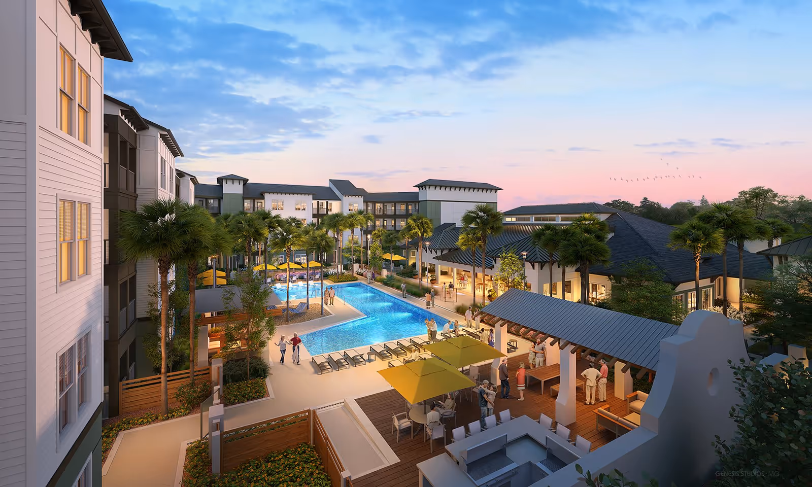Resort-style courtyard with a central swimming pool, lounge chairs, palm trees and surrounding apartment buildings at sunset.