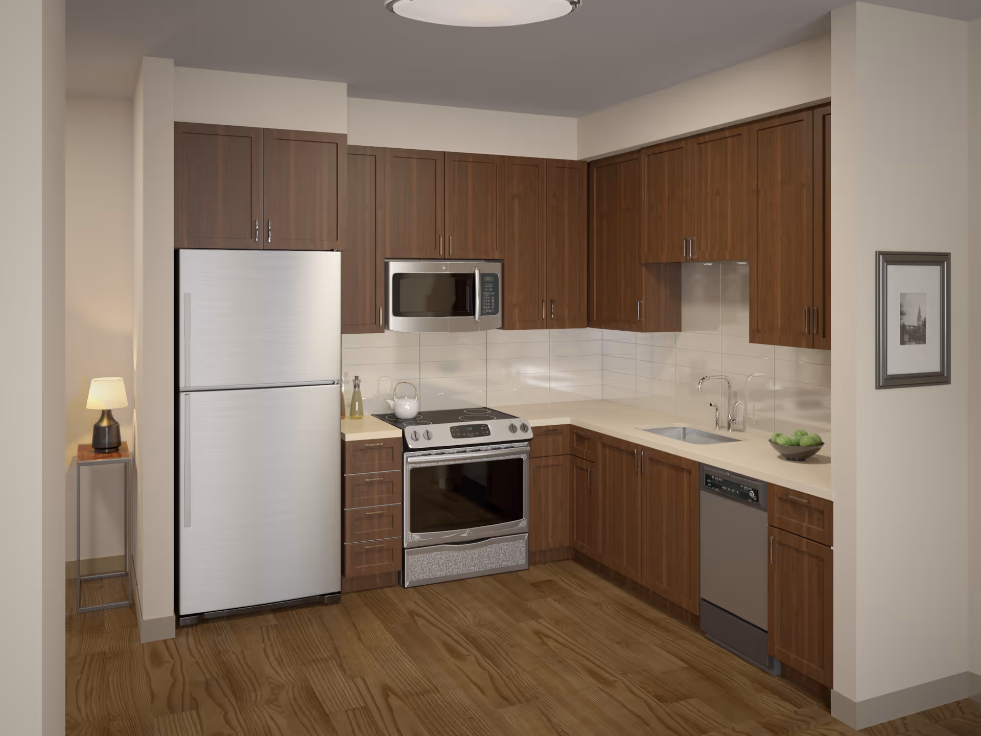 Well-lit modern kitchen with stainless steel refrigerator, stove, microwave, dishwasher, and wood cabinets.