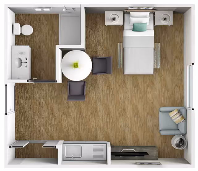 Top-down floor plan of a small living space featuring a bedroom area with a single bed and two nightstands, a bathroom with a toilet, sink, and shower, a round dining table with two chairs, a small kitchen area with a sink and countertop, and a living area with a single armchair and side table.
