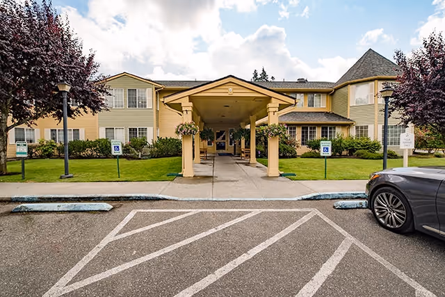 Front view of Brookdale Everett senior living facility entrance with covered walkway