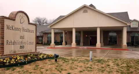Exterior view of McKinney Healthcare and Rehabilitation Center entrance with sign