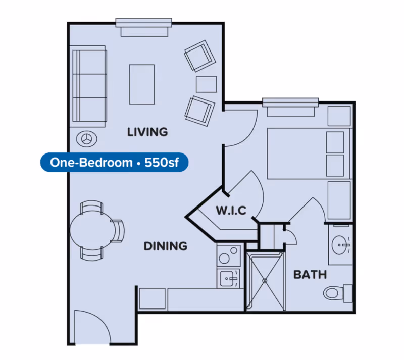 Floor plan of a one-bedroom, 550 square feet apartment at Acclaim Living, showing a living room with sofa and chairs, a dining area with a round table and chairs, a kitchen area, a walk-in closet (W.I.C), a bedroom with a bed and nightstands, and a bathroom with a shower, sink, and toilet.