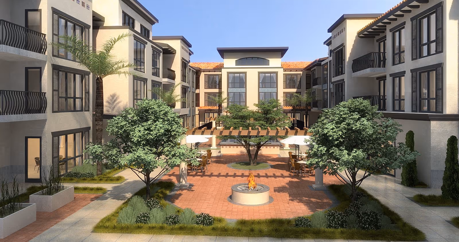 Sunlit landscaped courtyard with trees, seating areas, umbrellas and a central fire pit surrounded by multi-story buildings.