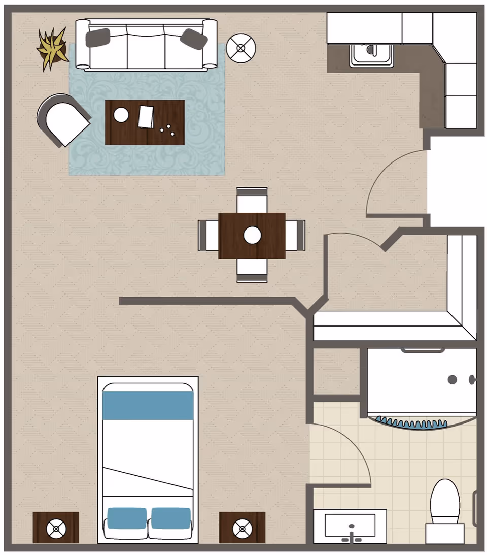Top-down floor plan of a studio apartment showing a combined living/dining/sleeping area, a small kitchen and a bathroom.