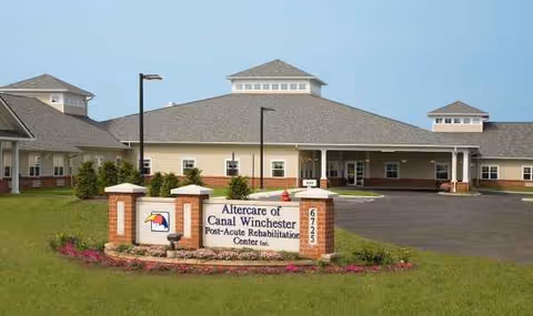 Front view of Altercare Canal Winchester entrance with sign and circular driveway.
