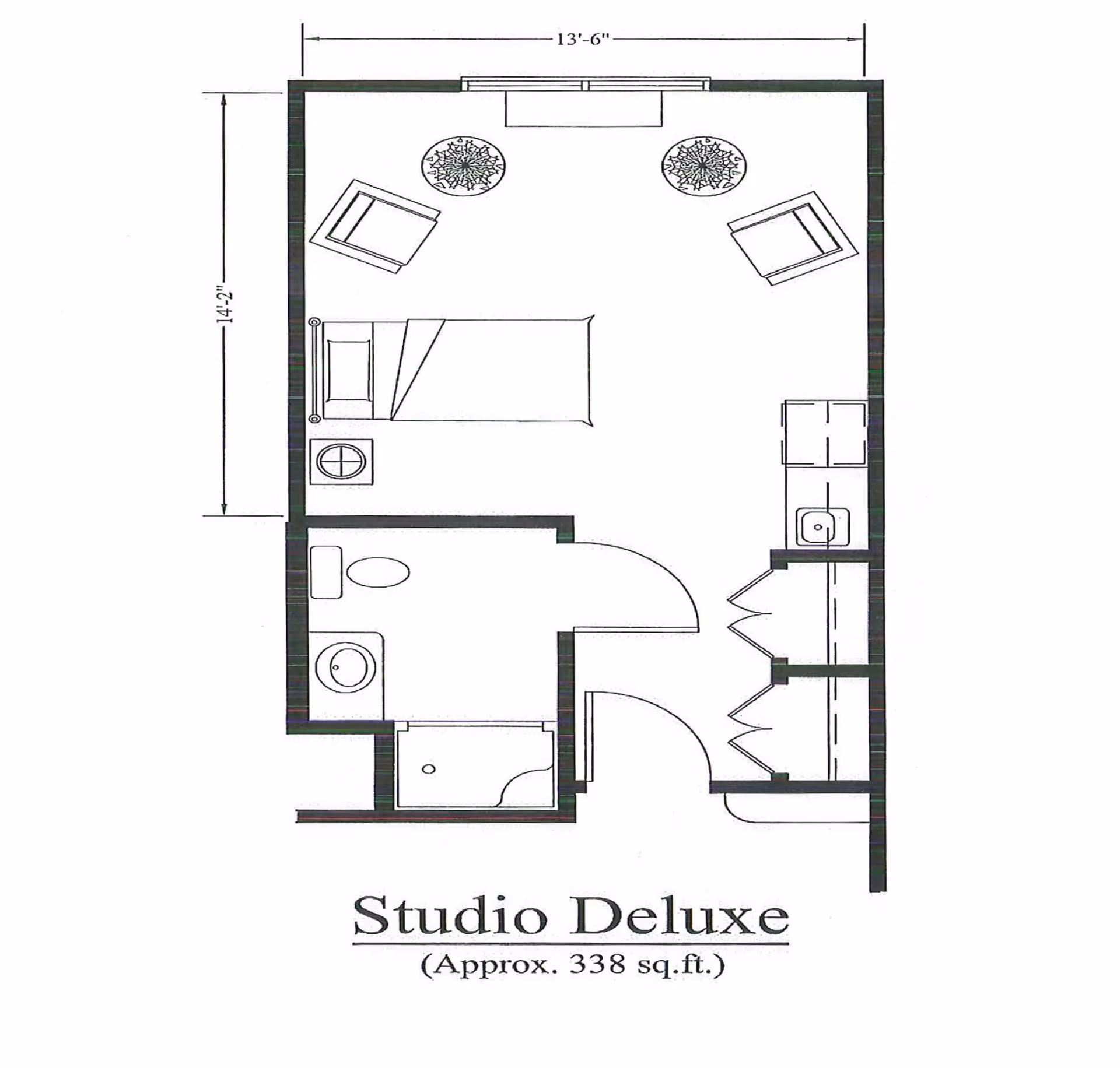 Floor plan of a Studio Deluxe apartment approximately 338 square feet, showing a combined living and sleeping area with a bed, two chairs, two small tables, a kitchenette with a sink and cabinets, and a bathroom with a toilet, sink, and shower.